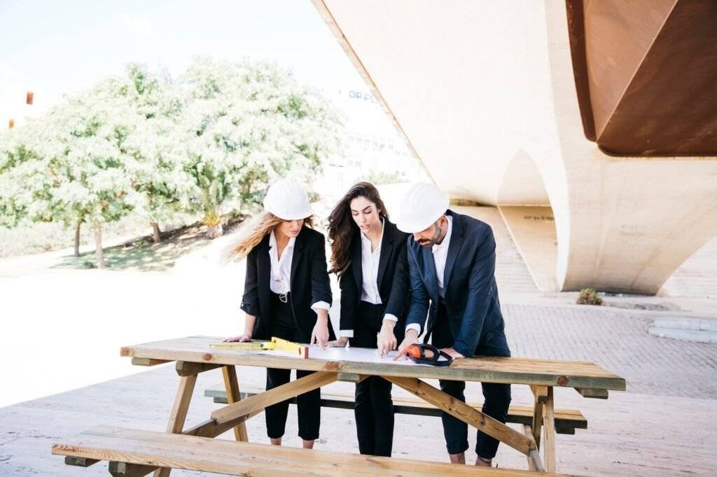 three-architects-planning-something_23-2147702514